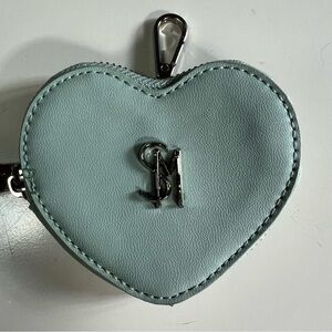 NWOT Steve Madden Frosty Green Coin Pouch. Plastic protector still on zipper tab